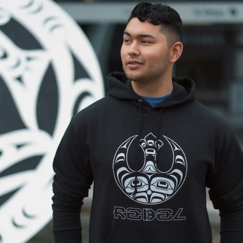 Male-model-Rebellion-Hoodie-Andy-Everson-Indigenous-Apparel_3000x.webp